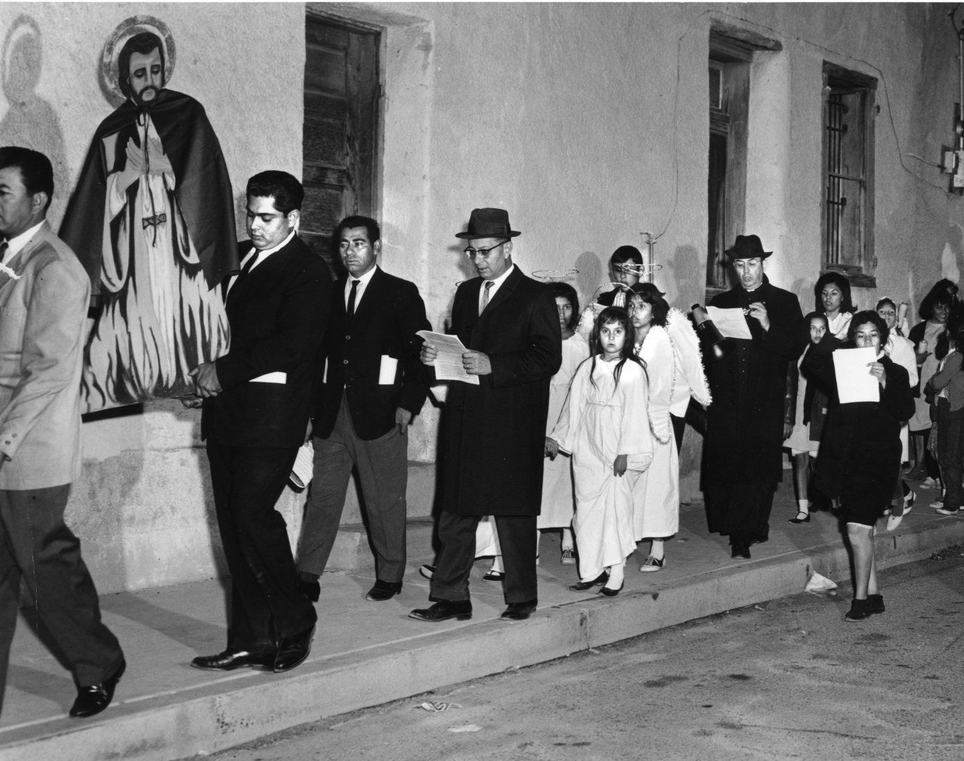 Participating in Las Posadas downtown